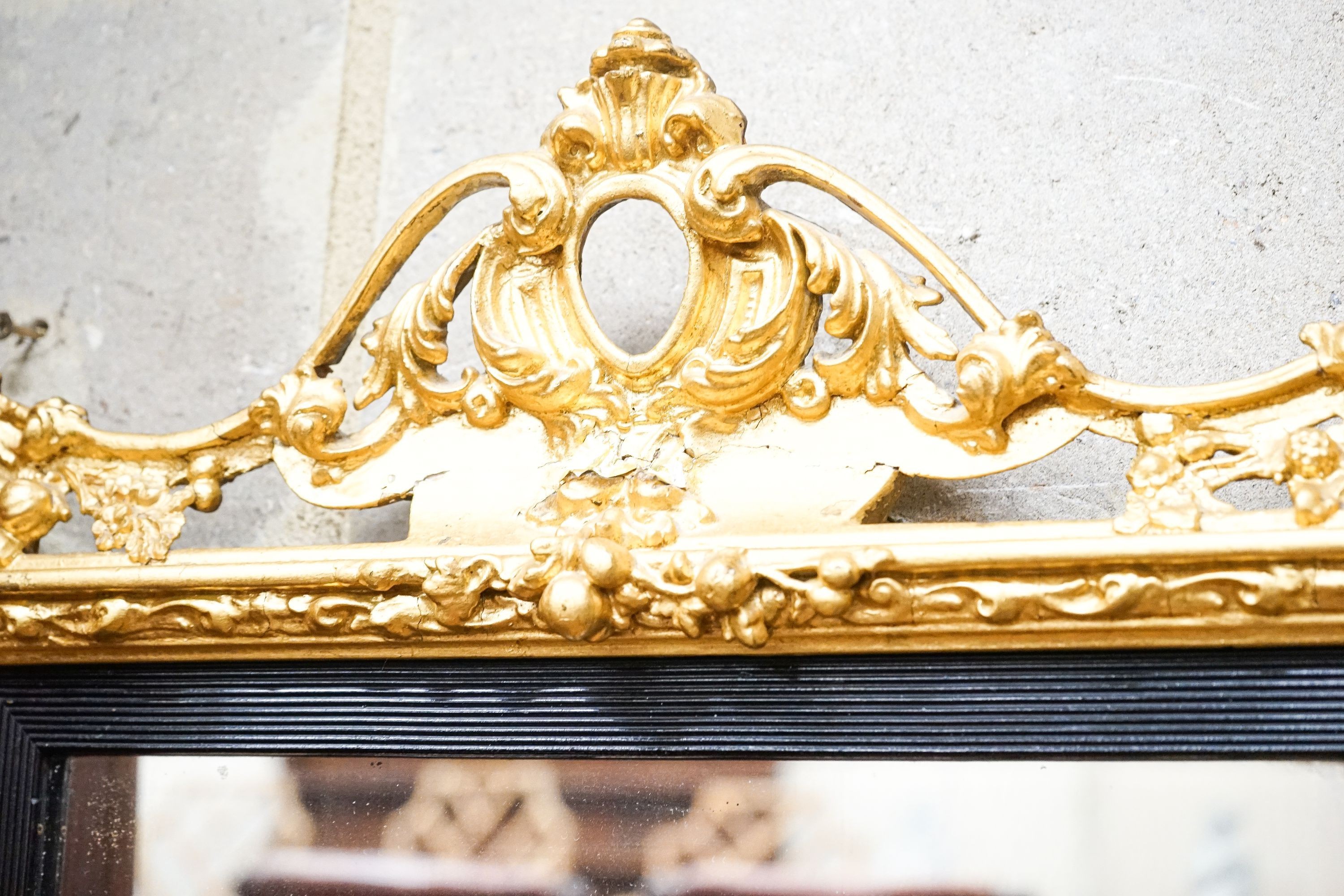 A Victorian gilt gesso wall mirror, width 58cm, height 66cm